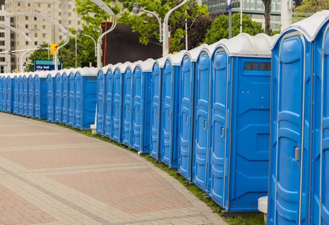 a row of portable restrooms at a fairground, offering visitors a clean and hassle-free experience in Bradenton, FL